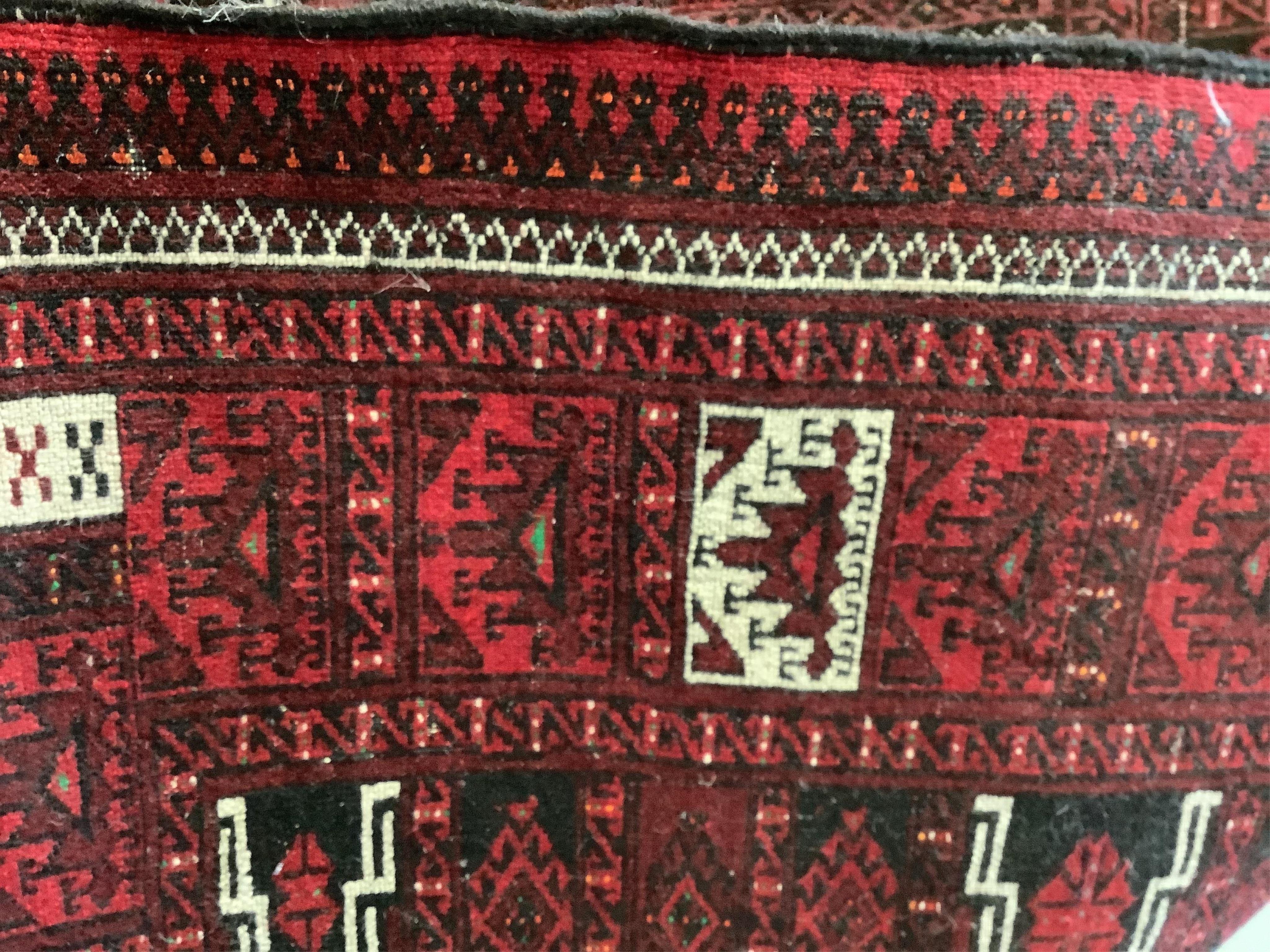 A Bokhara rug, 220 x 132cm. Condition - good